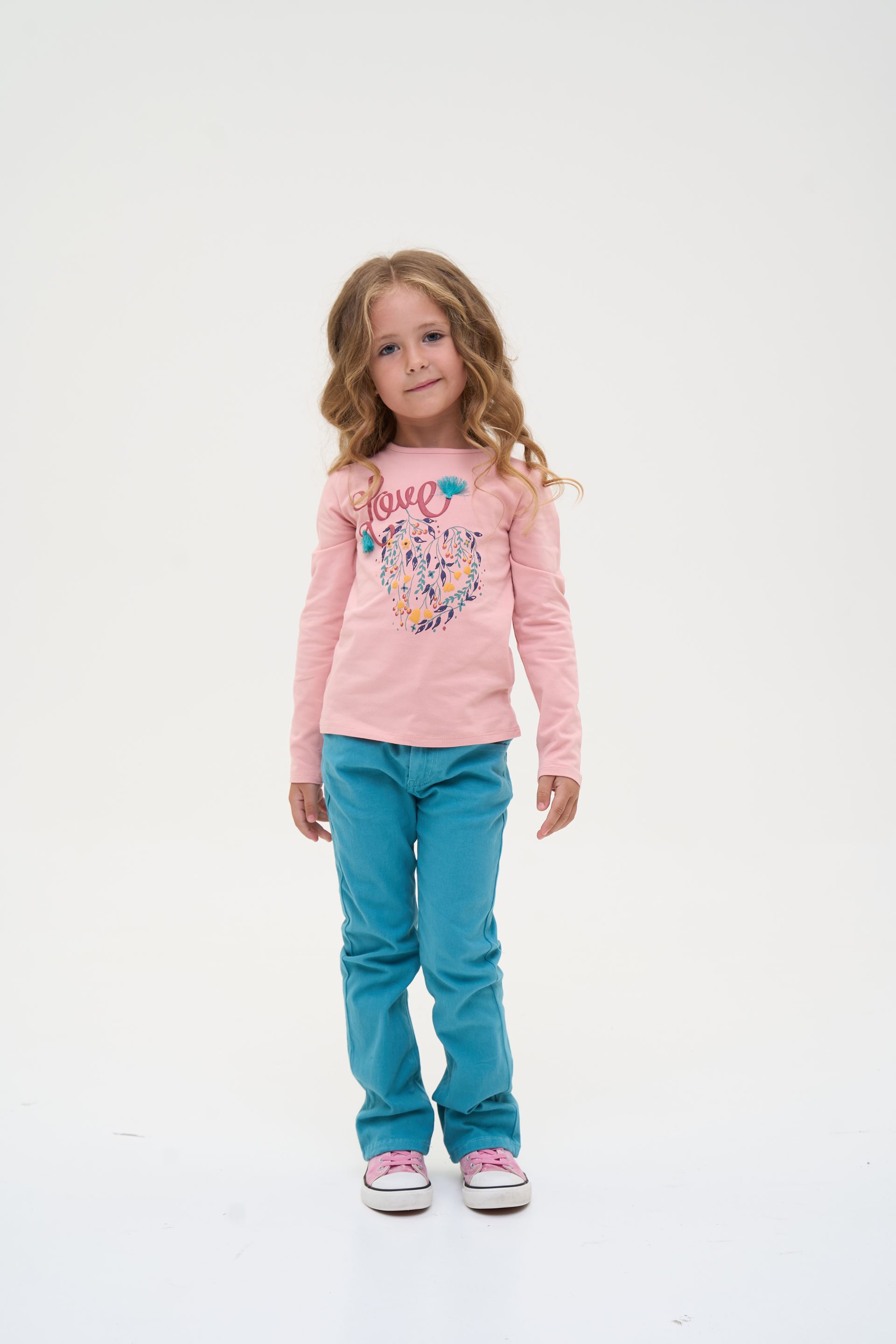 Set for a girl: pink long-sleeve shirt and jeans