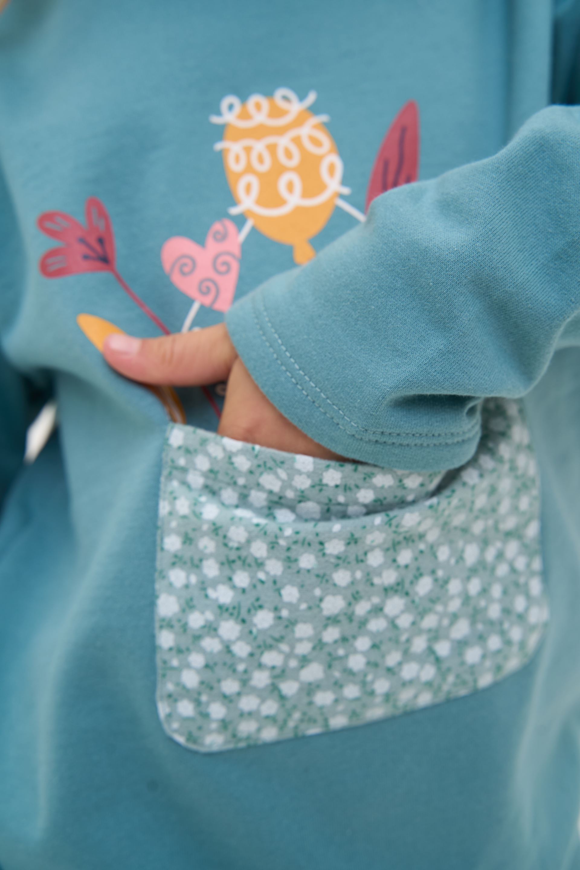 Set for a girl - sweatshirt and short skirt