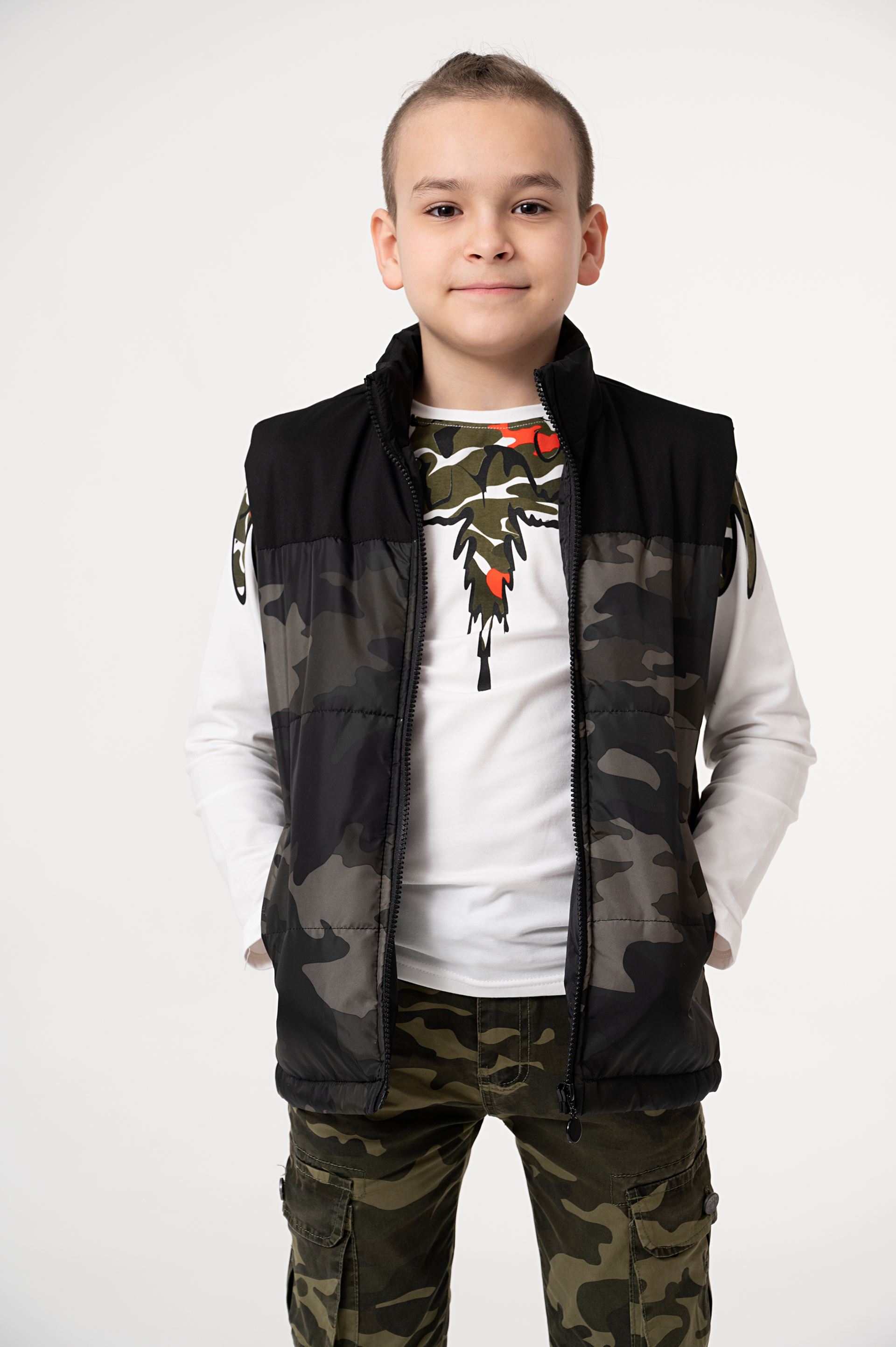 Puffer vest for a boy in camouflage