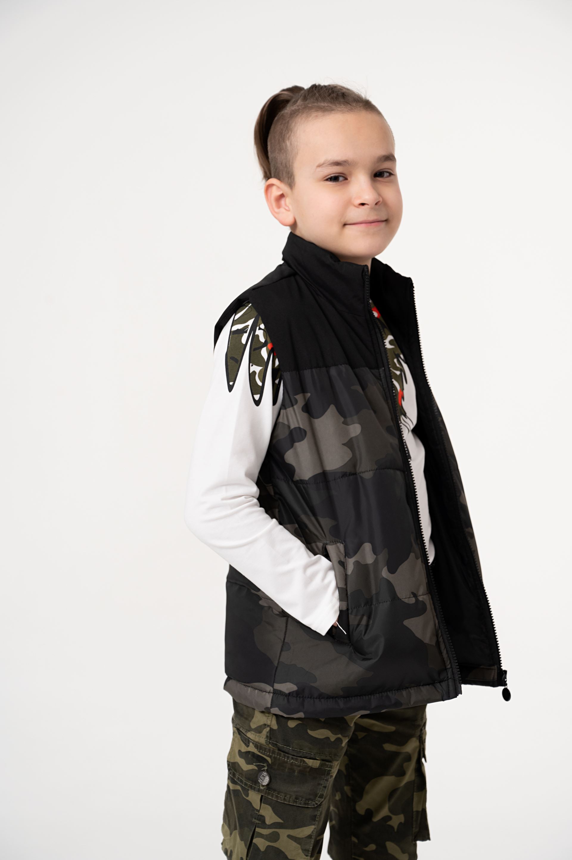 Puffer vest for a boy in camouflage