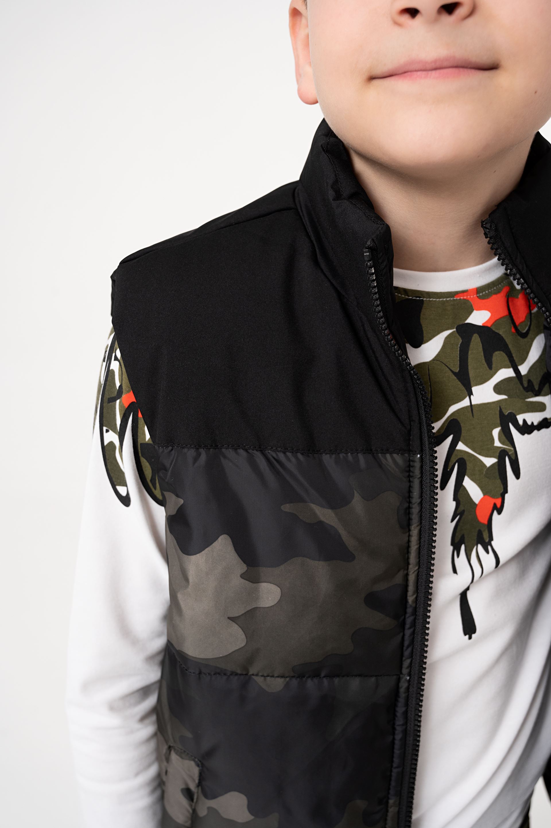 Puffer vest for a boy in camouflage