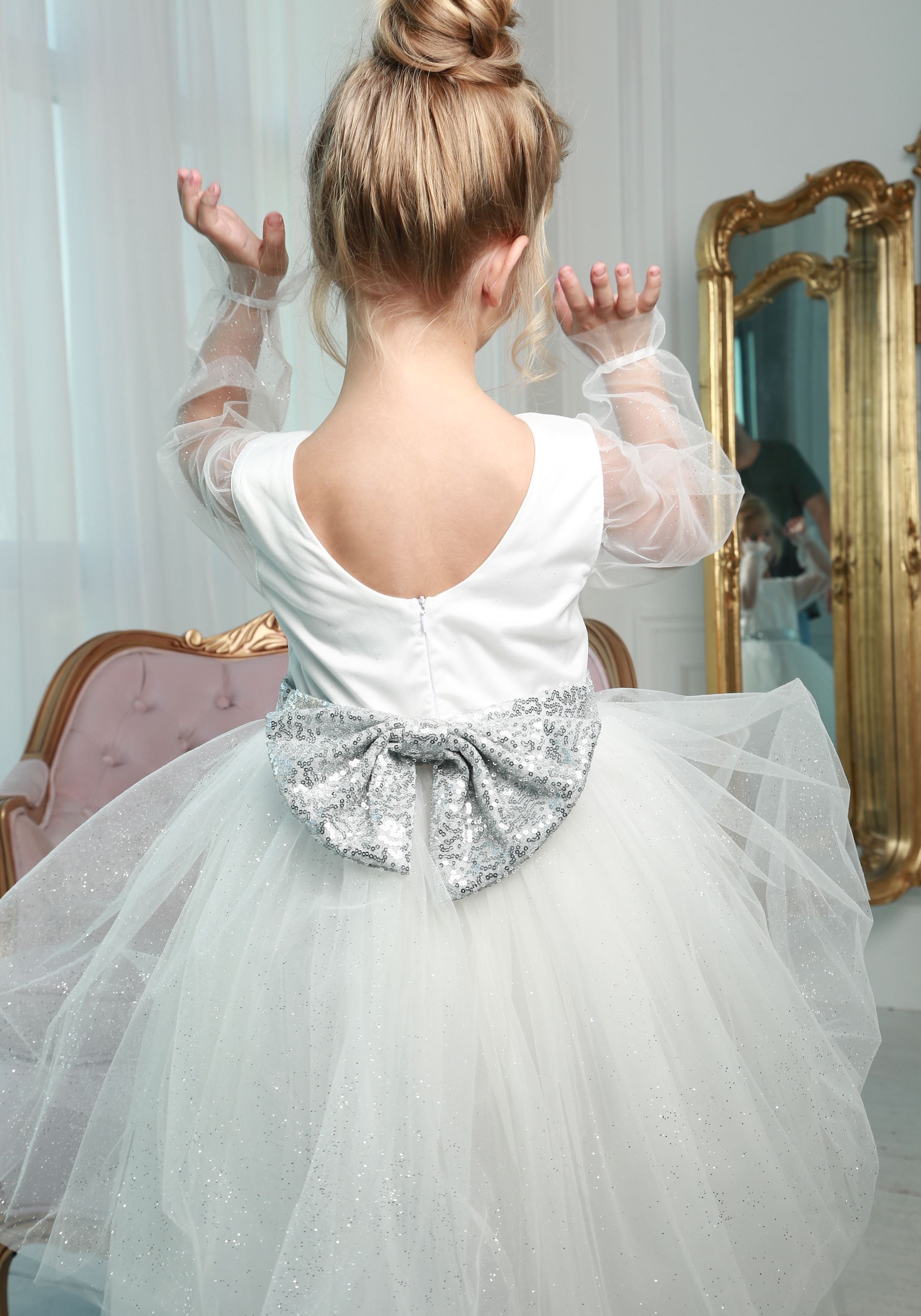 Elegant lush dress with a silver bow