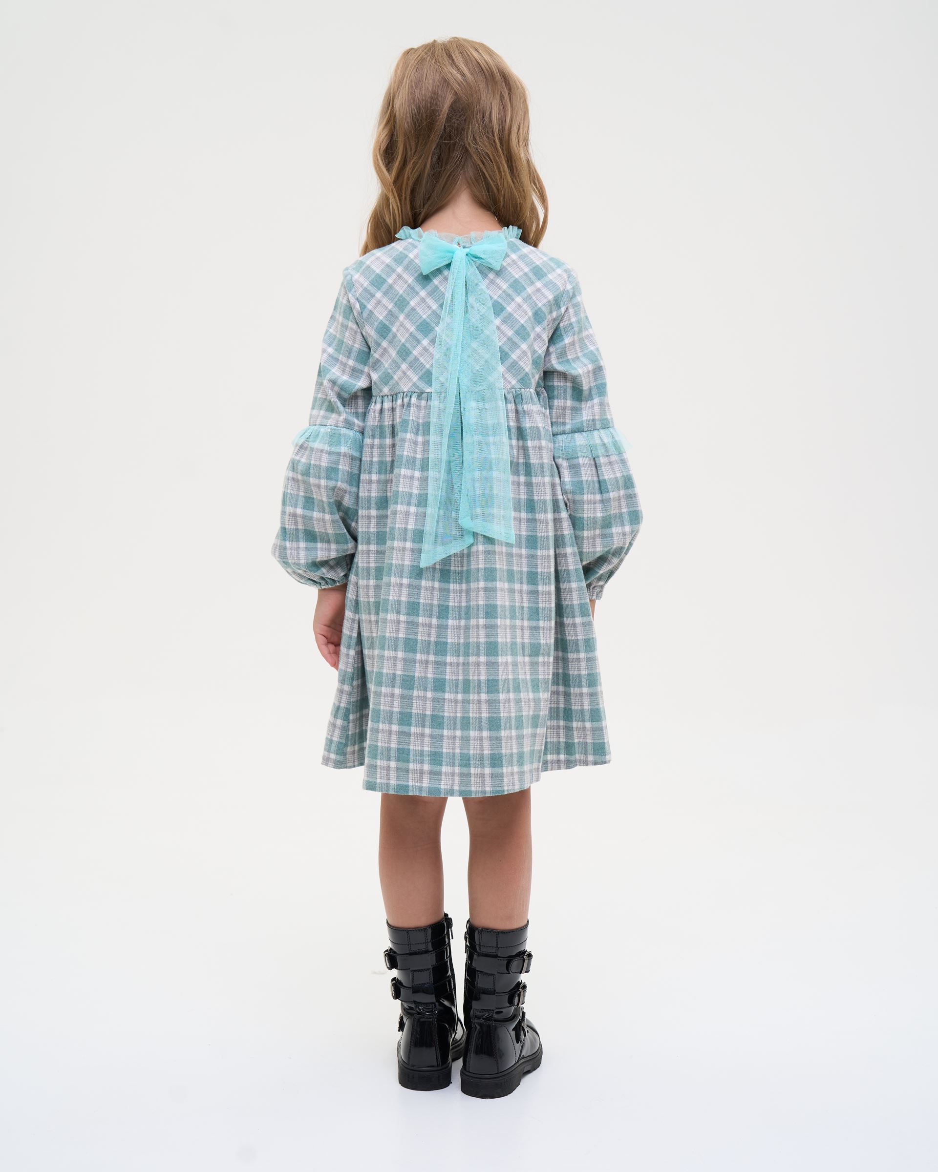 Dress with long sleeves, bow closure, green check